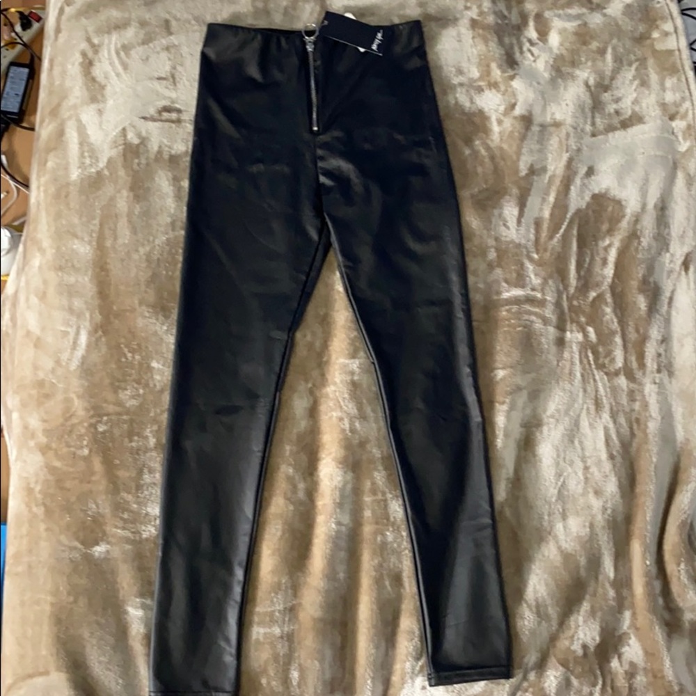 Cherry Koko faux leather legging sold by Nasty Gal